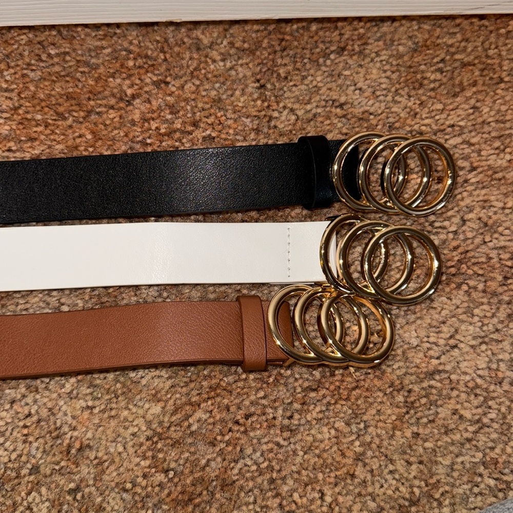 3 pack of belts. Brown, Black, and white! Brand new never used.